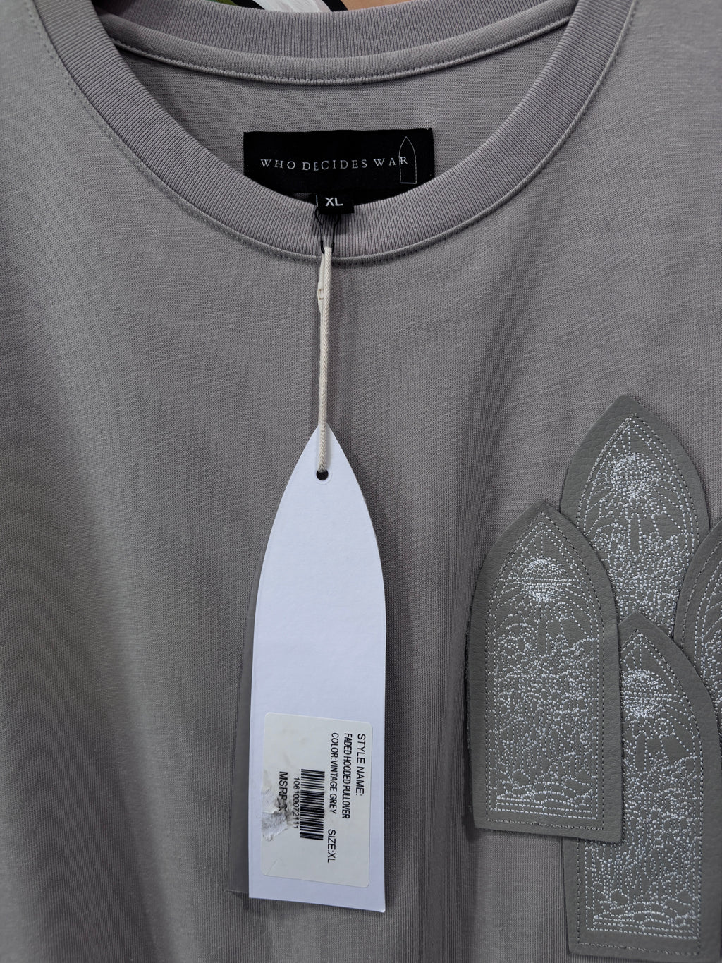 Who Decides War Leather Window Tee