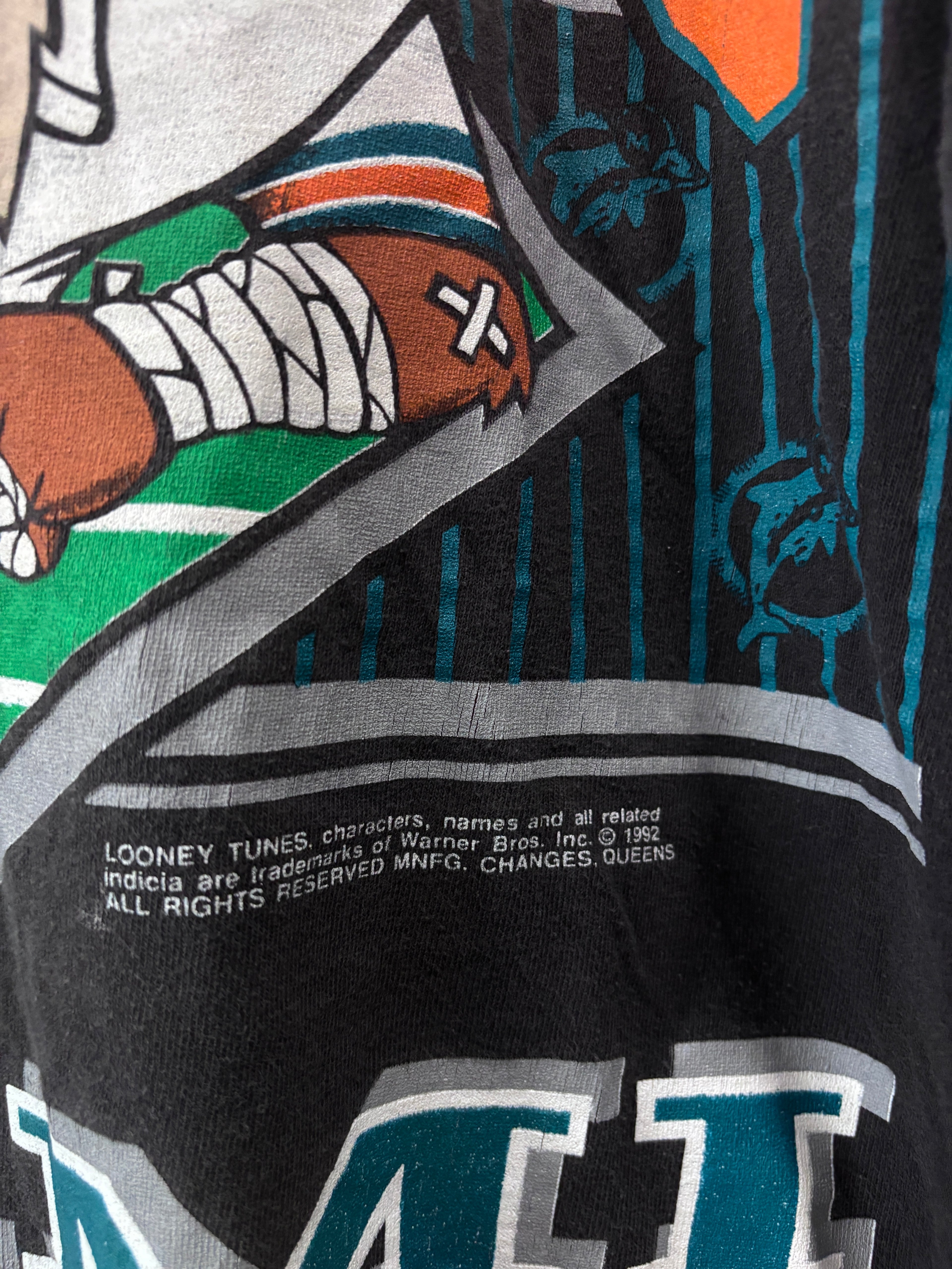 Vintage 1992 Miami Dolphins
Looney Tunes Taz NFL T-Shirt